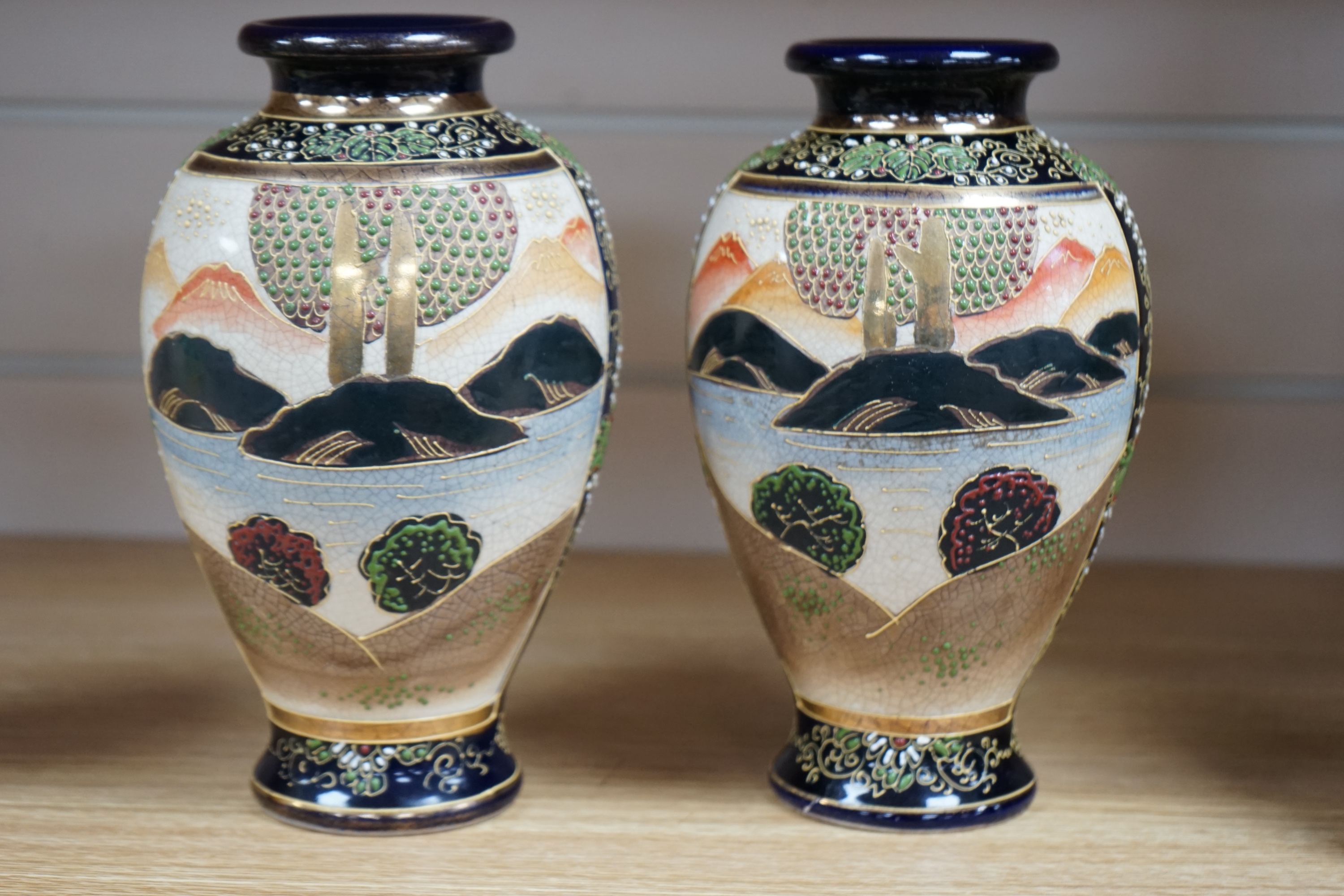 A pair of Japanese Satsuma vases, 22.5cm. Condition - good